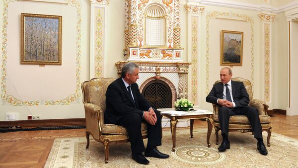 Russian President Vladimir Putin, right, and new President of Abkhazia Raul Khadzhimba during a meeting at the Novo-Ogaryovo residence. - Sputnik International