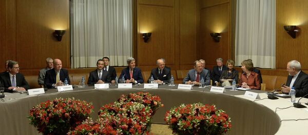 Foreground, from left: German Foreign Minister Guido Westerwelle, UK Foreign Secretary William Hague, Chinese Foreign Minister Wang Yi, US Secretary of State John Kerry, French Foreign Minister Laurent Fabius, Russian Foreign Minister Serei Lavrov, EU foreign policy chief Catherine Ashton and Iranian Foreign Minister Mohammad Javad Zarif during the talks on Iran's nuclear program, in Geneva (File). Foreground, from left: German Foreign Minister Guido Westerwelle, UK Foreign Secretary William Hague, Chinese Foreign Minister Wang Yi, US Secretary of State John Kerry, French Foreign Minister Laurent Fabius, Russian Foreign Minister Serei Lavrov, EU foreign policy chief Catherine Ashton and Iranian Foreign Minister Mohammad Javad Zarif during the talks on Iran's nuclear program, in Geneva (File). - Sputnik International