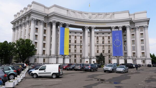 The building of Ukraine's Interior Ministry with flags of Ukraine and EU displayed on its facade. - Sputnik International