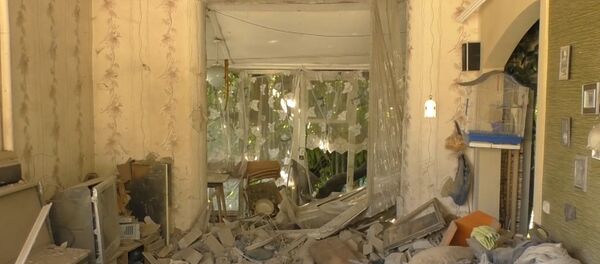 Donetsk Shelling Aftermath: Burnt Furniture and Ruined Walls Donetsk Shelling Aftermath: Burnt Furniture and Ruined Walls - Sputnik International
