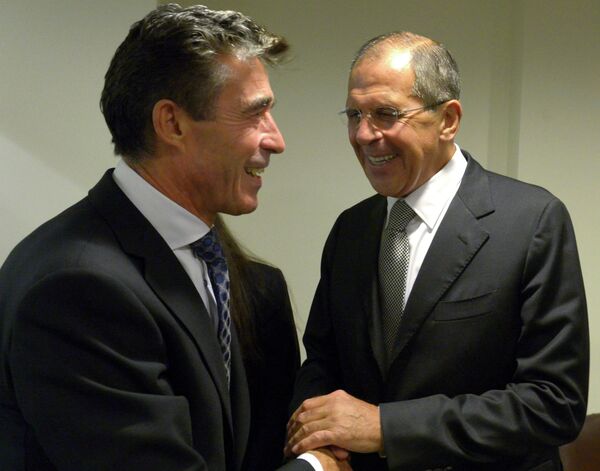 Russian Foreign Minister Sergey Lavrov (right) and NATO Secretary - General Anders Fogh Rasmussen during a meeting in the framework of the ministerial week 68th Session of the UN General Assembly. - Sputnik International