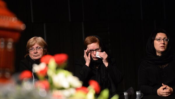 Mother of late Rossiya Segodnya photocorrespondent Andrei Stenin during the farewell ceremony in Moscow. - Sputnik International