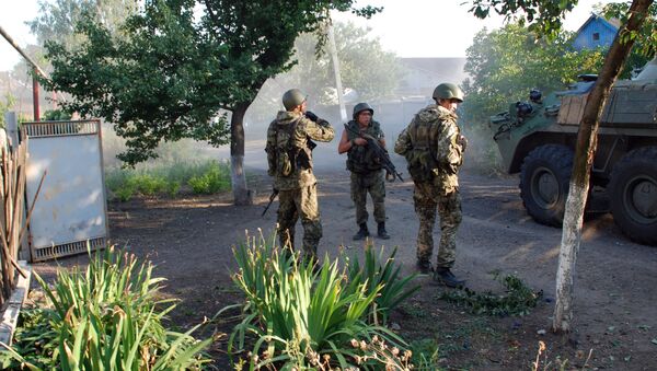Militiamen of the self-proclaimed Donetsk People's Republic in the city of Ilovaisk in Ukraine's southeast. - Sputnik International