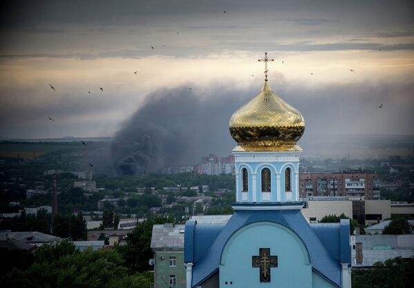 A fire during shelling of Lugansk. - Sputnik International