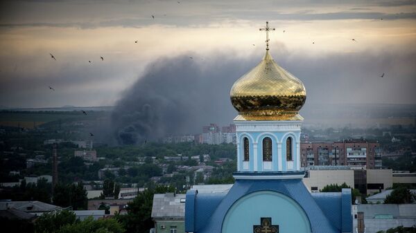 Fire during the shelling of Lugansk. - Sputnik International
