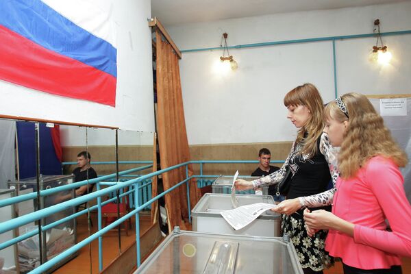 Crimea's Election Commission and Russia's Central Election Commission recognized the elections into the Republic’s State Council - Sputnik International