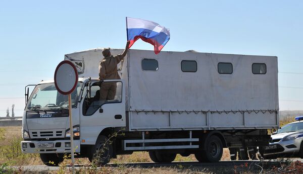 Trucks of a Russian convoy carrying humanitarian aid for Ukraine. - Sputnik International