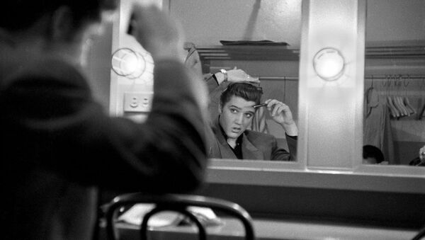 March 17, 1956. Backstage at the Dorsey Brothers 'Stage Show' rehearsal. One of the first Alfred Wertheimer's pictures of Elvis. - Sputnik International