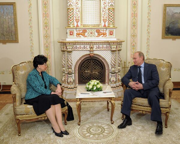President of Russia Vladimir Putin and Director-General of the World Health Organization (WHO) Margaret Chan during their meeting at Novo-Ogaryovo residence. - Sputnik International