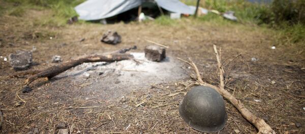 The massacre is the second in the area after a group of men armed with machetes and hatchets attacked two neighborhoods, Bgadi and Kadowu, near Beni on Wednesday night leaving some 30 dead and dozens injured. The massacre is the second in the area after a group of men armed with machetes and hatchets attacked two neighborhoods, Bgadi and Kadowu, near Beni on Wednesday night leaving some 30 dead and dozens injured. - Sputnik International